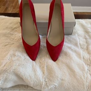 Pointed toe red pumps